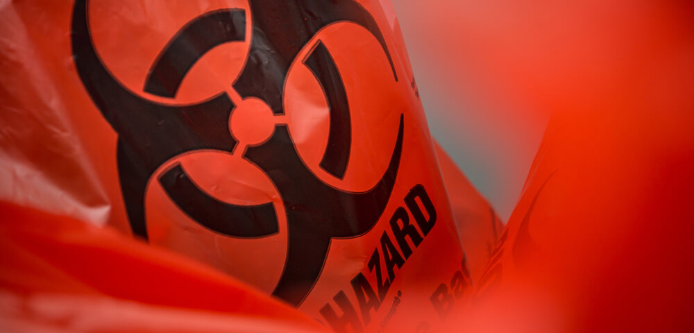 How to Safely Tie Red Biohazard Bags in Your Facility